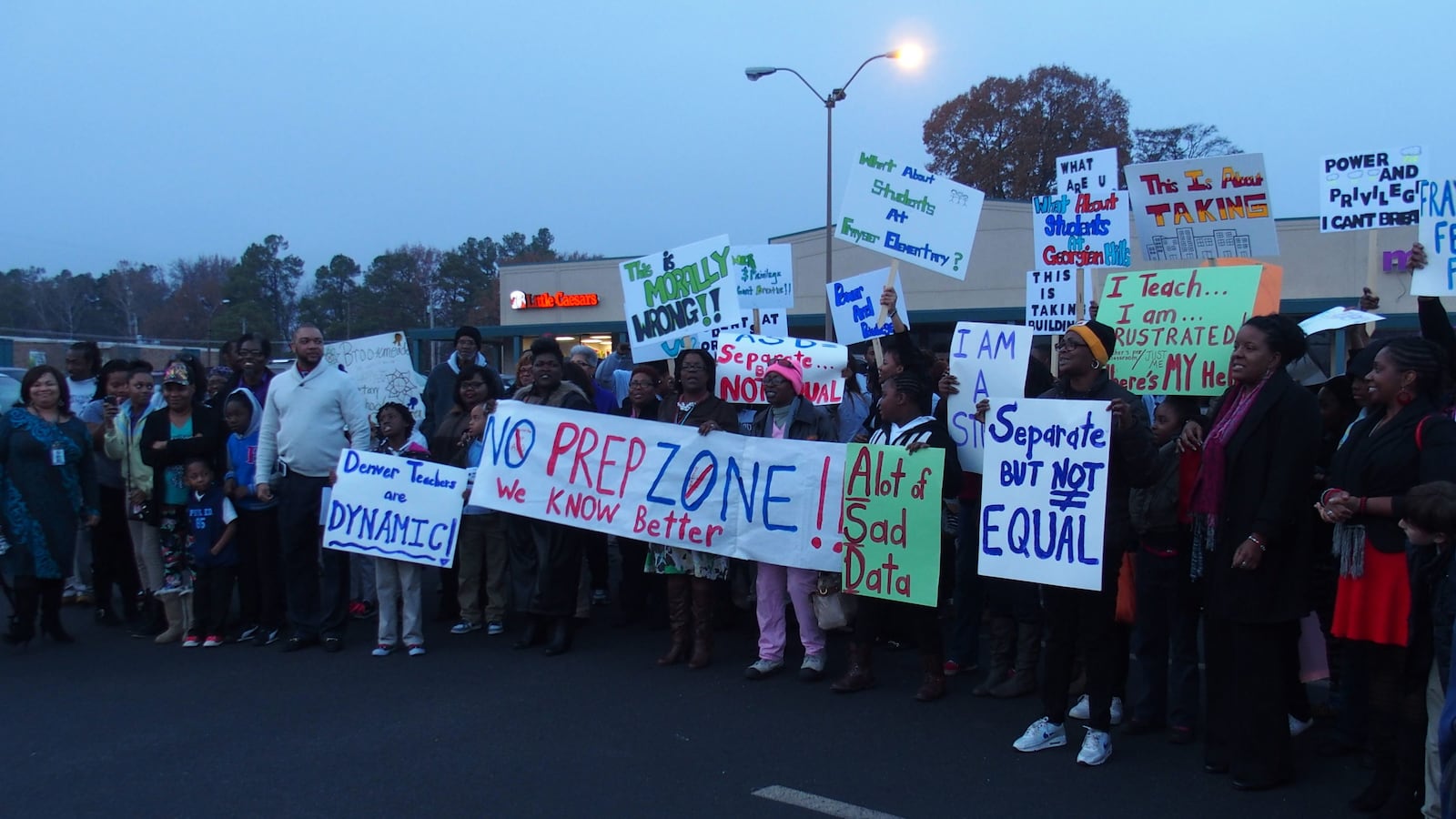 Parents, teachers and students protest in 2014 against the proposed state takeover of three Memphis schools.