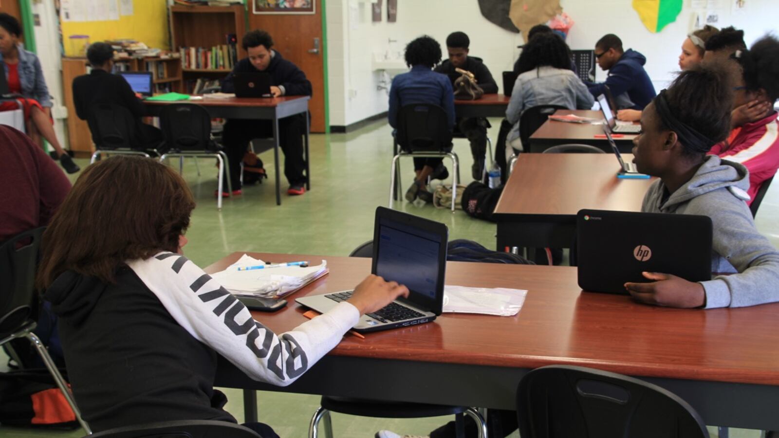 GRAD Academy students work on a writing assignment during an African-American history class. The South Memphis charter school shuttered in 2018.