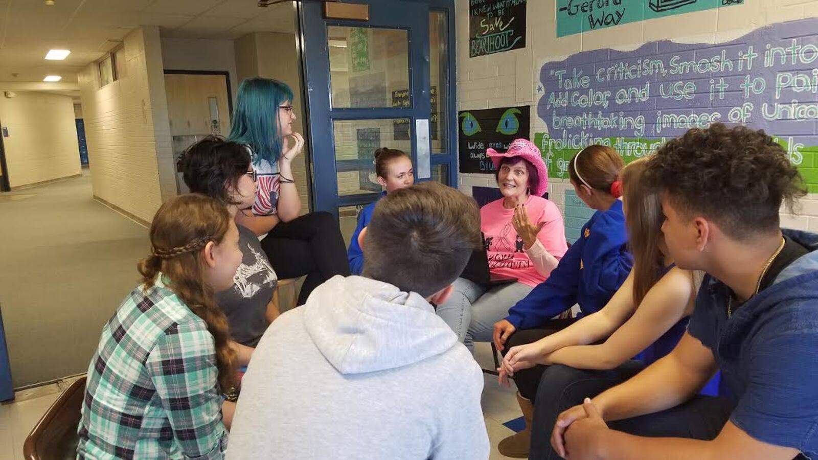 Lisa Lee, center right, one of two gifted and talented teachers at Wheat Ridge High School, leads a discussion. Lee was a teacher of the year finalist.