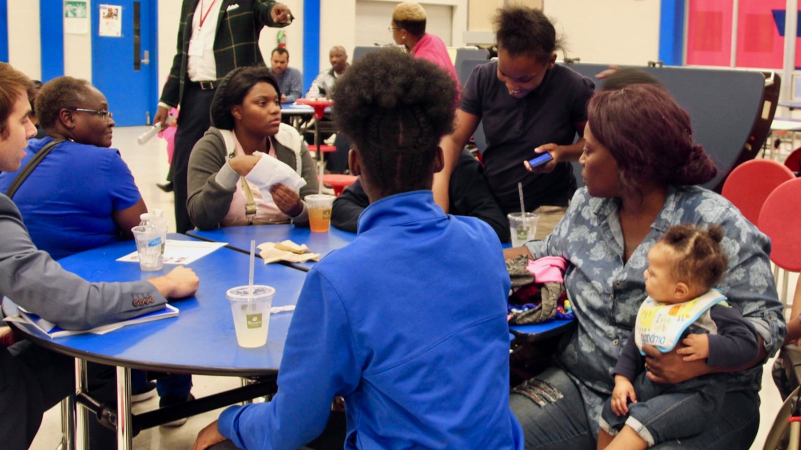Families weigh in during a conversation on school turnaround at Wooddale High School. It was one of several stops state officials made during a listening tour on the future of improving the state’s lowest-performing schools.