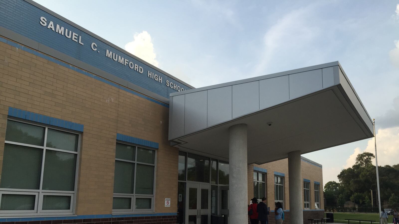 An exterior photograph of the Mumford H.S. entrance.