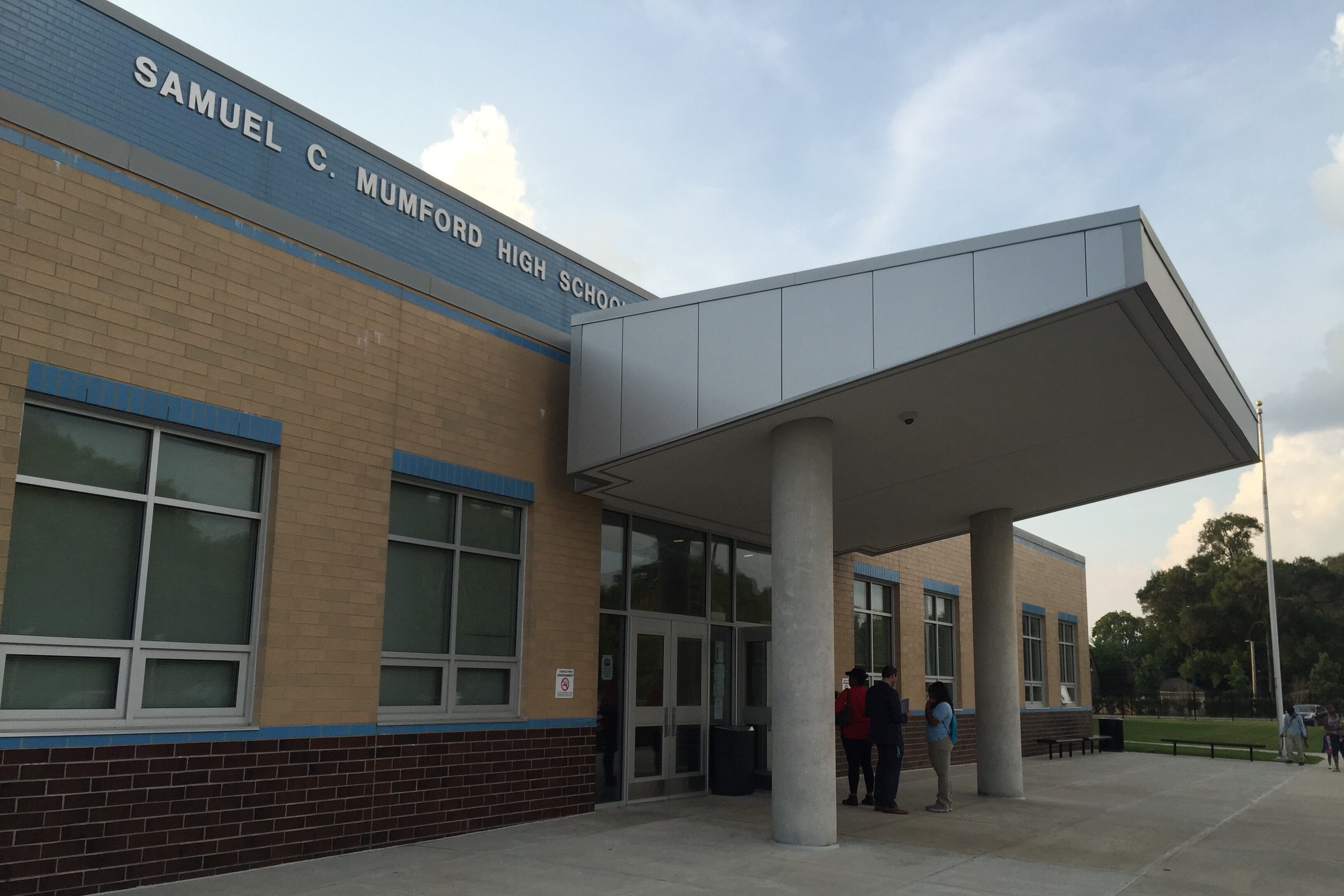 An exterior photograph of the Mumford H.S. entrance.