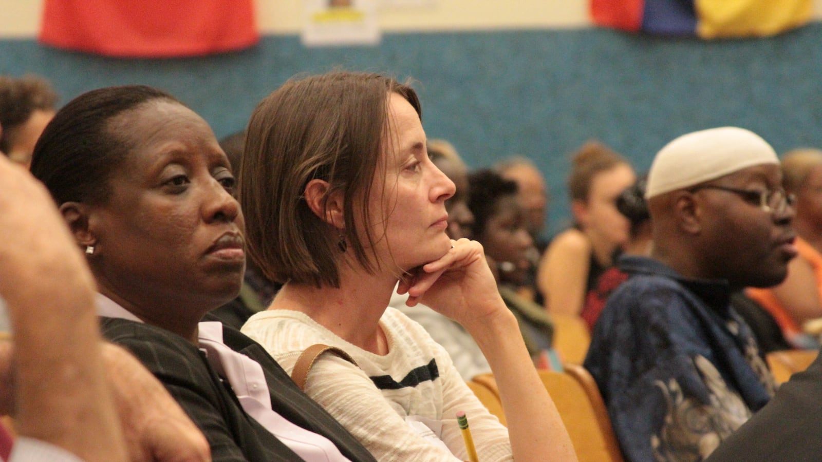Parents and community members at a Community Education Council meeting for District 13.