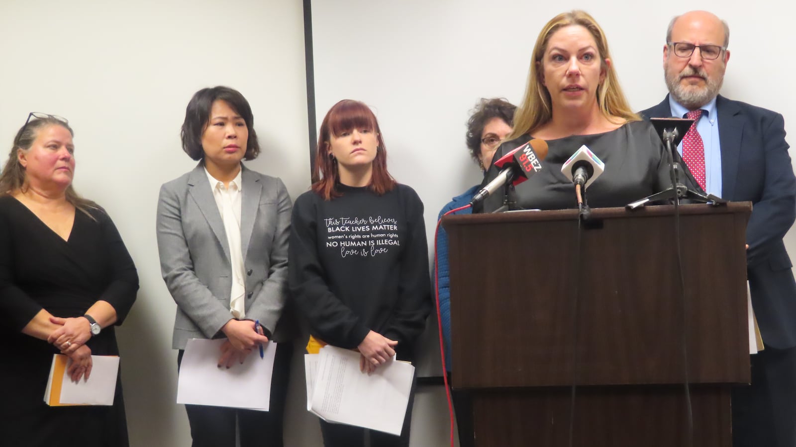 Laurel Henson, at the podium, spoke at a press conference in Chicago on Nov. 12, 2018, about her 2-year struggle to get a school nurse on staff to help her son, who suffers from seizures.