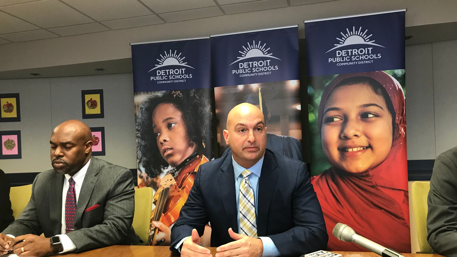 Detroit Superintendent Nikolai Vitti, right, speaks during a news conference Wednesday. He’s shown here with Desmond Blackburn, the CEO of The New Teacher Center.