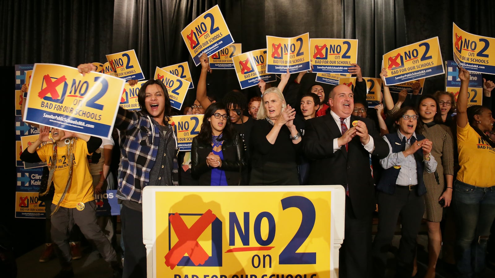 Anti-charter school activists celebrate results at an election night Massachusetts Democrats and anti-Question Two watch party at Copley Plaza Hotel in Boston on Nov. 8, 2016. (Photo by Barry Chin/The Boston Globe via Getty Images)