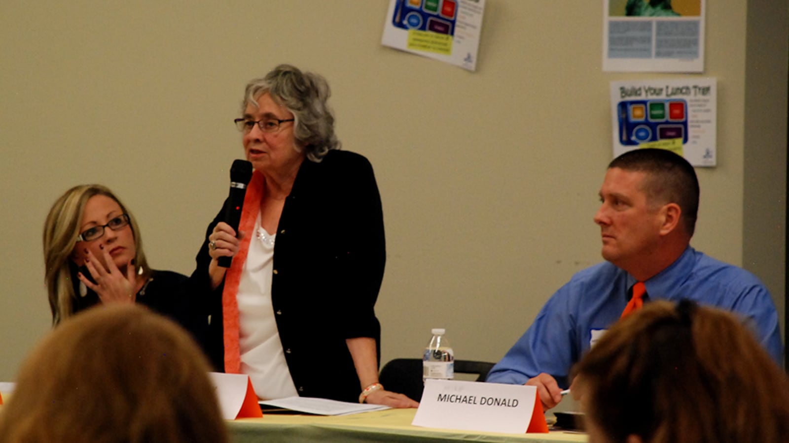 Aurora school board candidates, from left, Monica Colbert, Billie Day, and Mike Donald took questions from parents at a candidate forum Thursday.