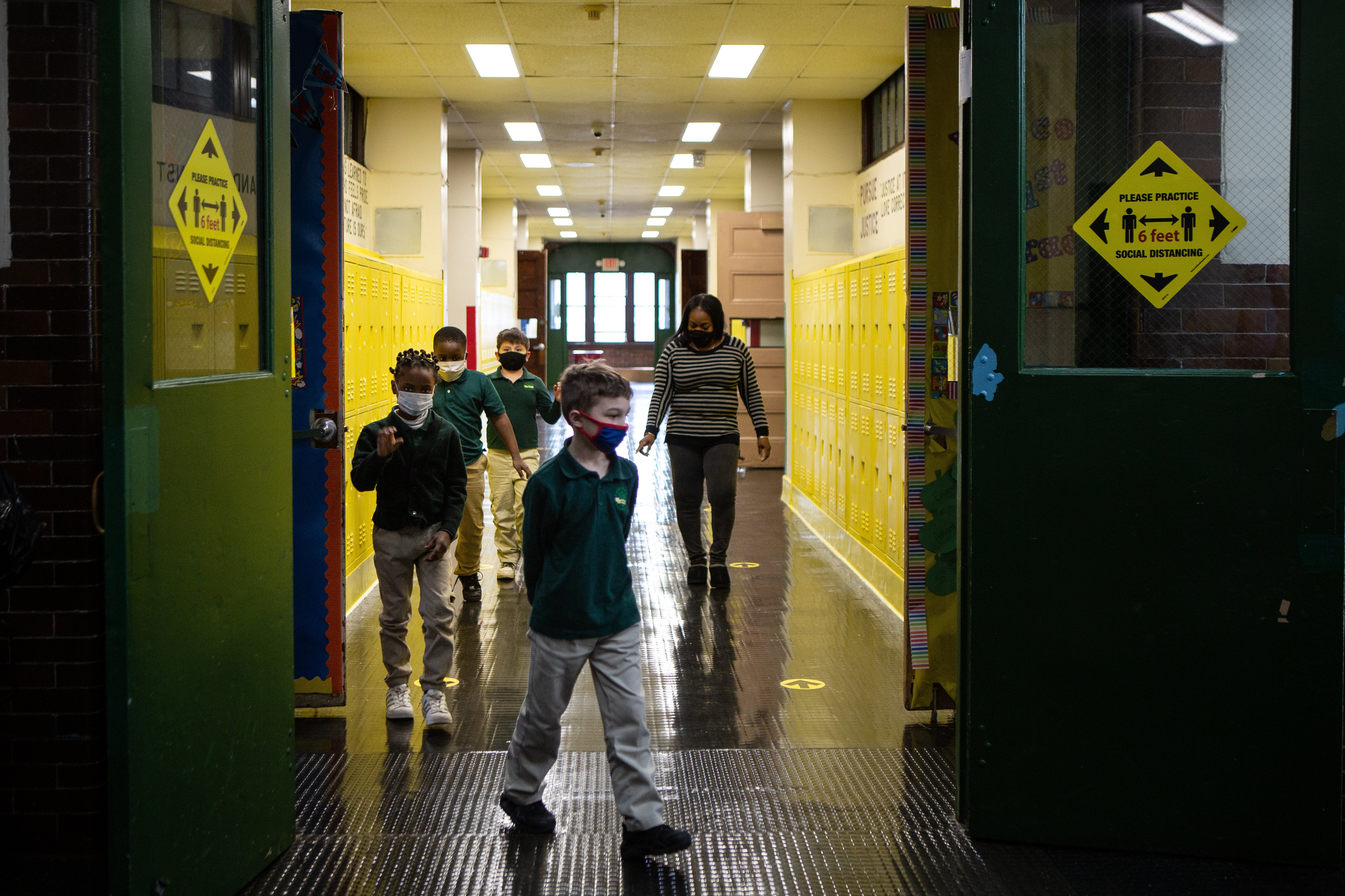 Students walk through the hall at Roseville Community Charter school in Newark, N.J.