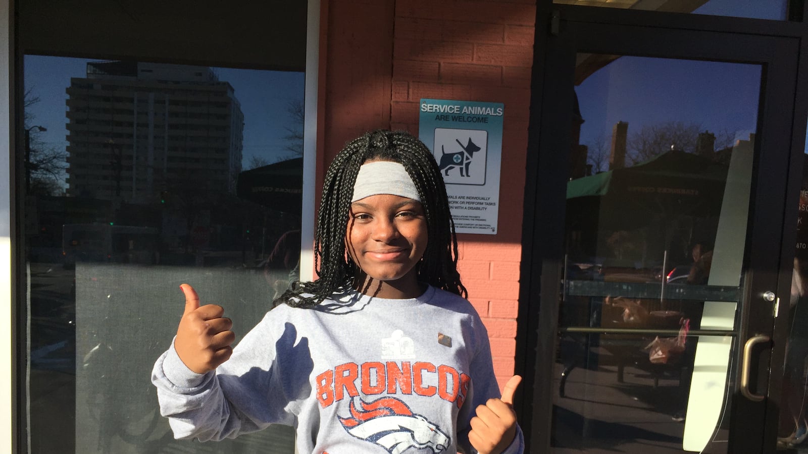 Jermai Howard, a seventh grader at Denver's Dora Moore K8, skipped school to see Peyton Manning celebrate the Denver Broncos Super Bowl victory.
