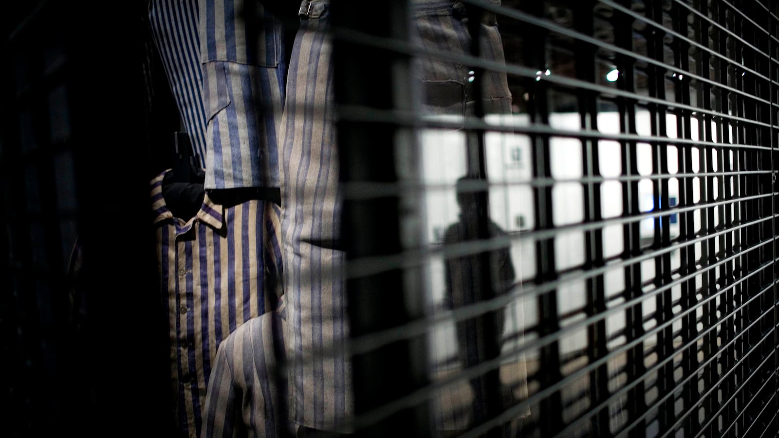 Museum exhibit of striped uniforms