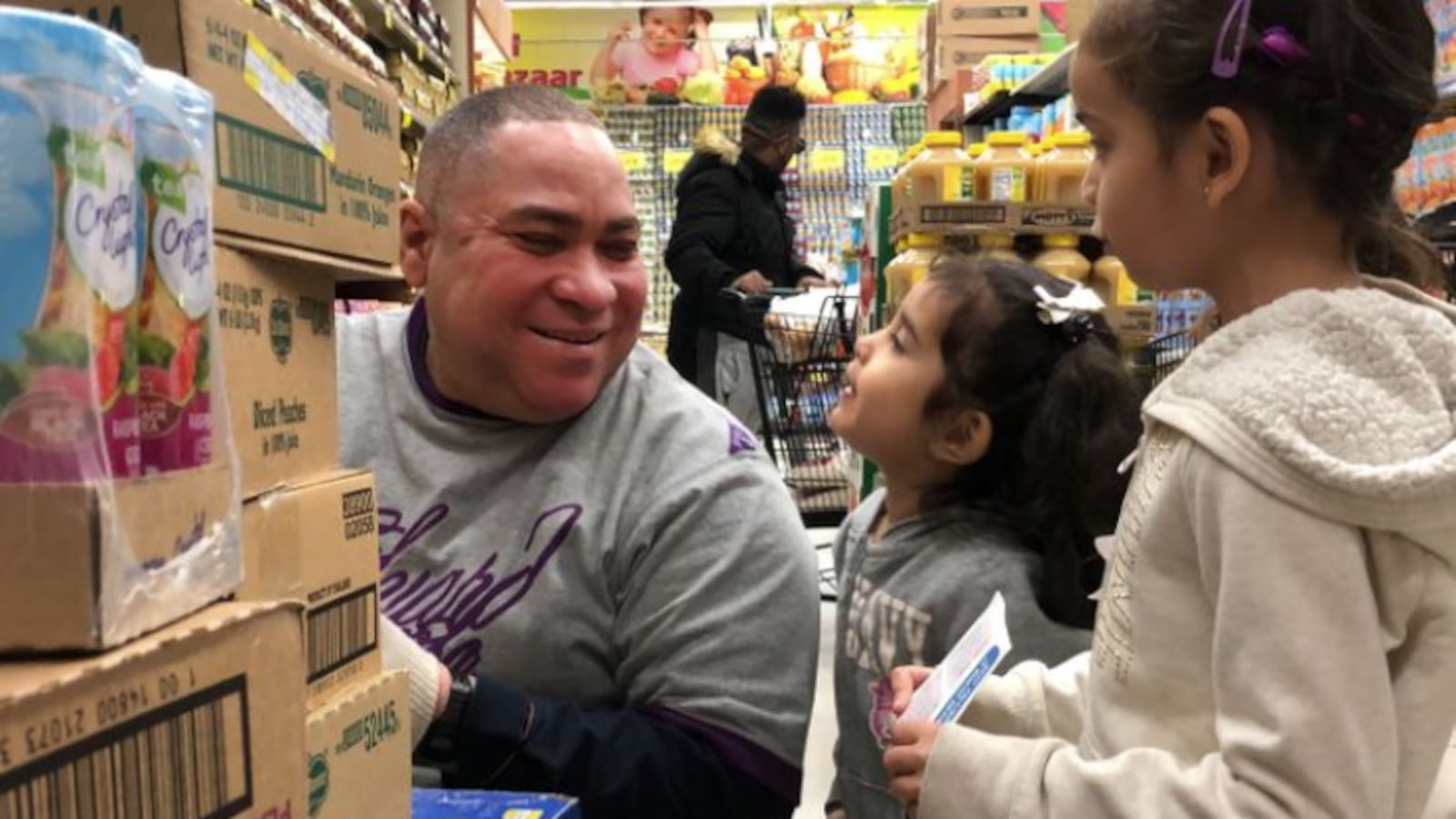 Cailynn, 3, and her big sister Chrystie, 5, ask a Food Bazaar worker for help with the scavenger hunt, Jan. 30, 2020.