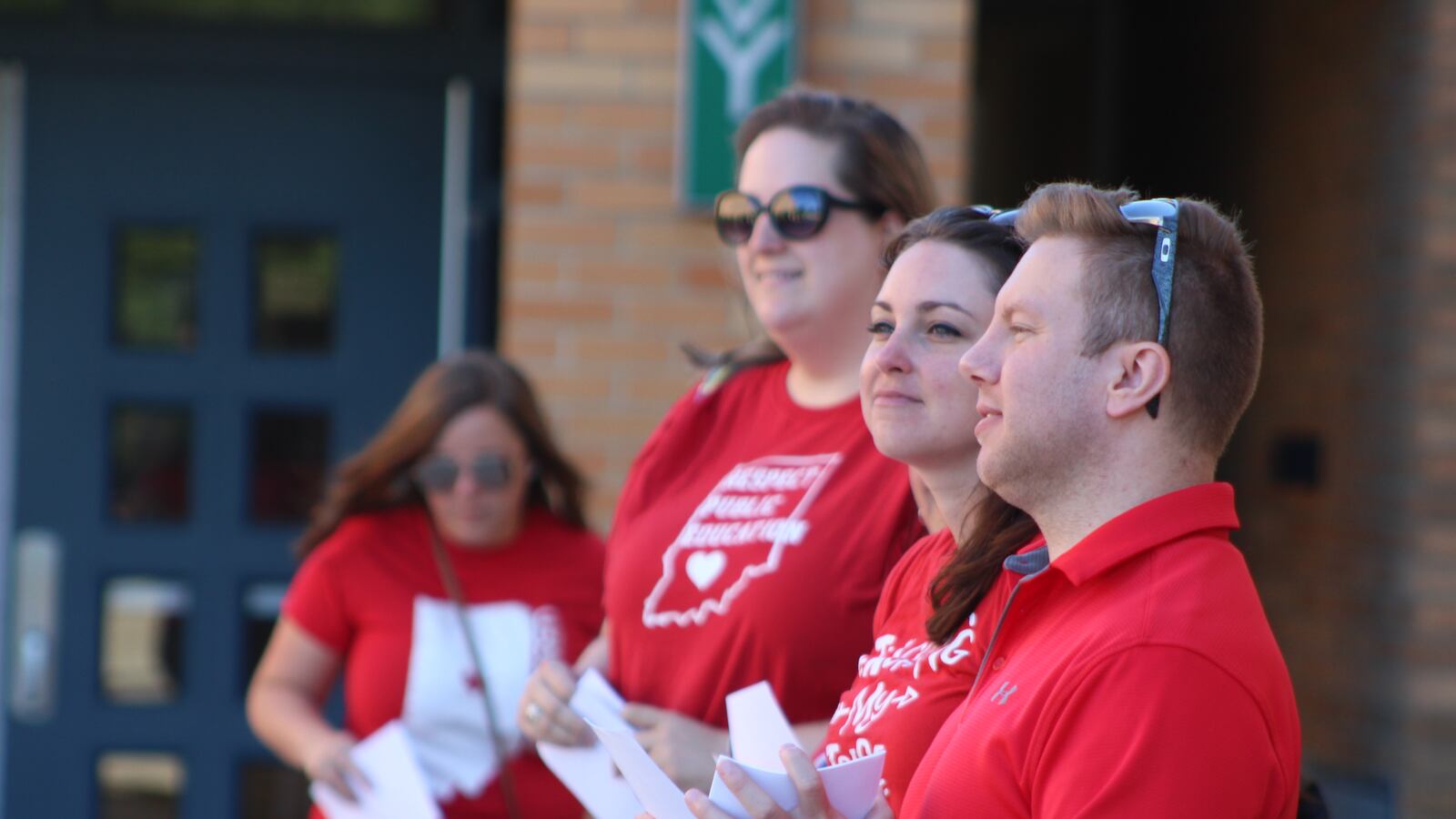 Teachers flank the entrance to Ivy Tech Community College's Noblesville campus ahead of a training session hosted by the Indiana Education Employment Relations Board.