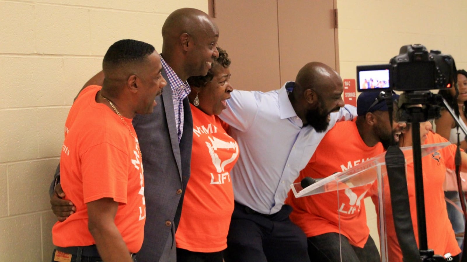 Leaders of Memphis Lift take literally Superintendent Dorsey Hopson’s call to “lock arms and work together” following Hopson’s presentation to the parent advocacy group in July 2017.