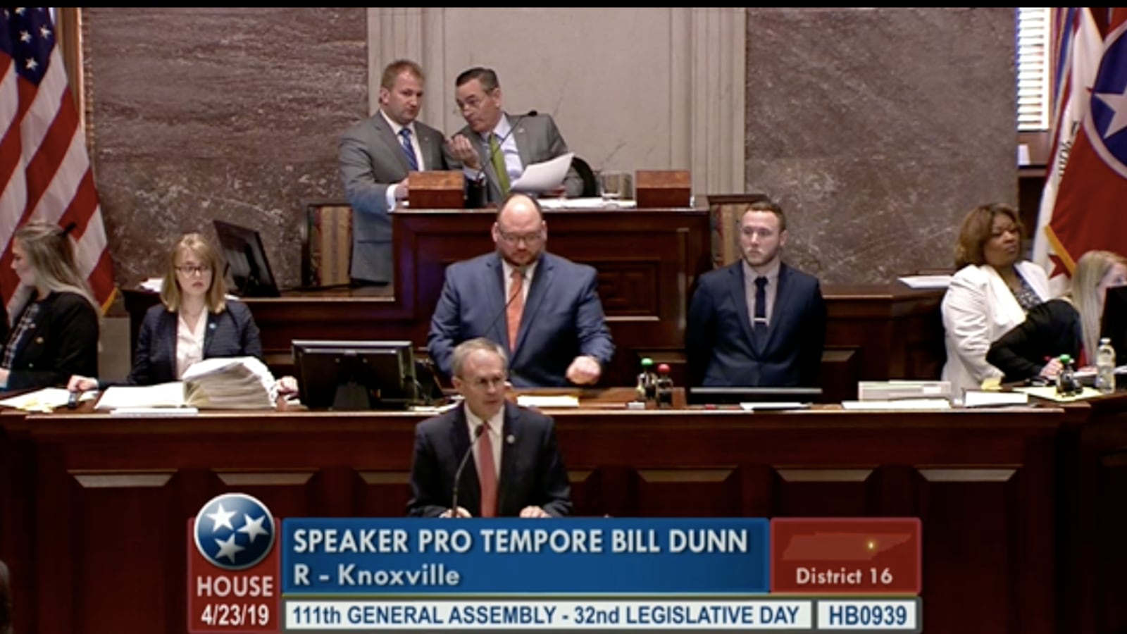 Rep. Bill Dunn (front center) urges passage of Gov. Bill Lee's education savings account bill on Tuesday in the House of Representatives, as Speaker Glen Casada and Majority Leader William Lamberth confer. Members voted 50-48 for the proposal.