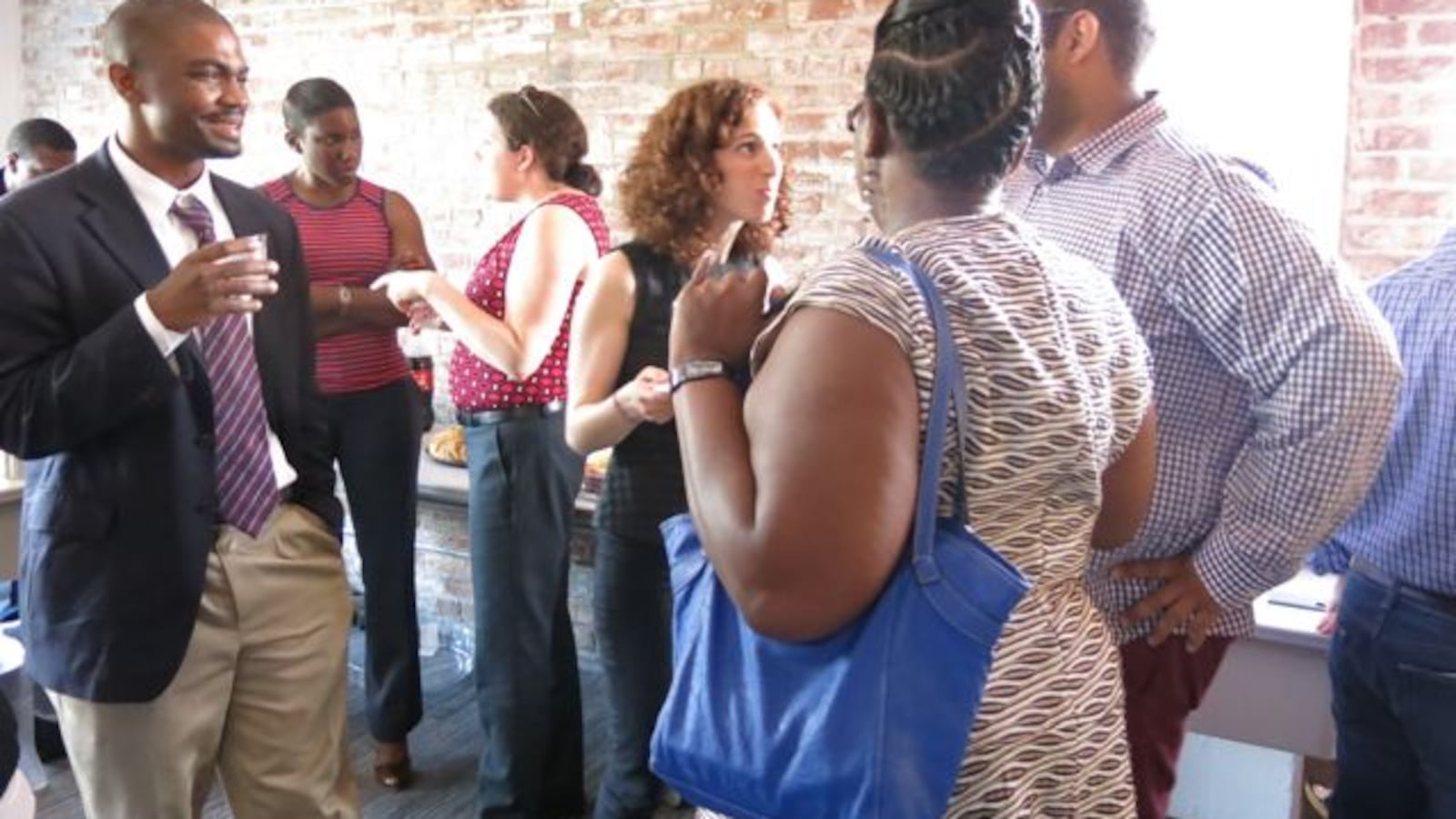 Daarel and Elizabeth chat with guests during the Meet and Greet on May 22.