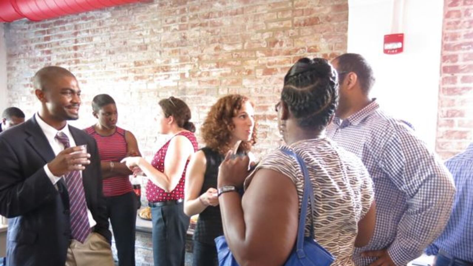 Daarel and Elizabeth chat with guests during the Meet and Greet on May 22.
