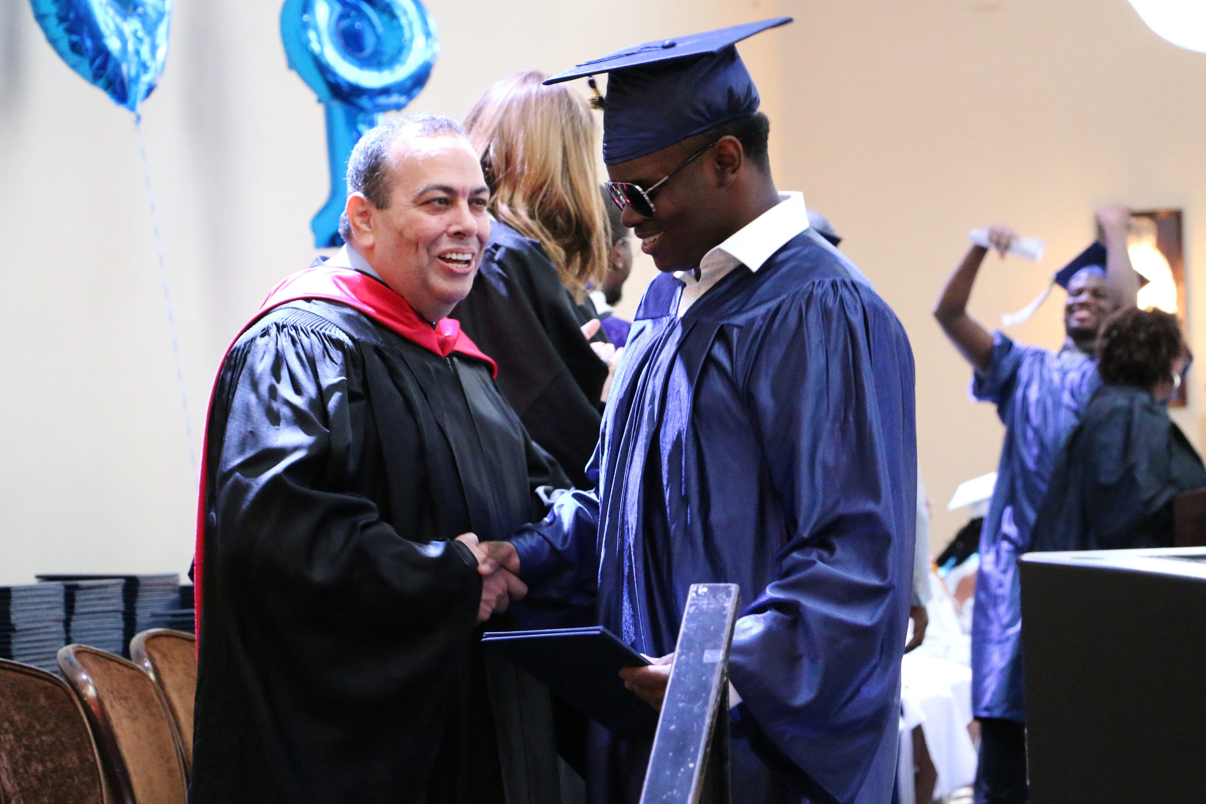 Newark Superintendent Roger León at a graduation ceremony in 2018.