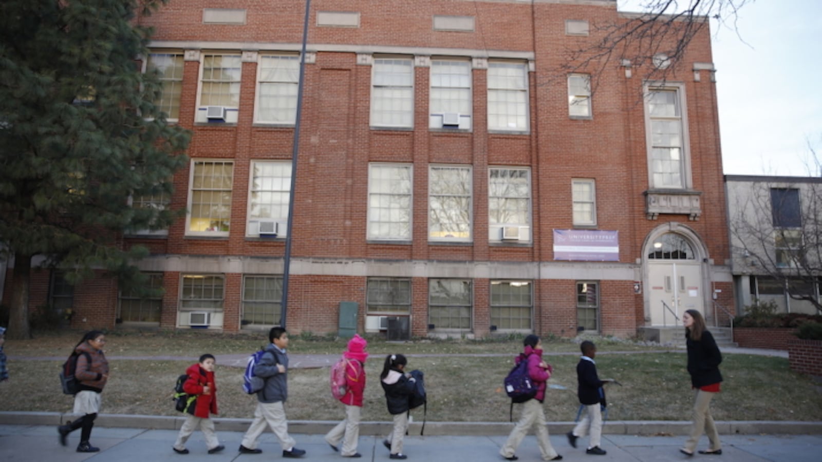 Students at University Prep, a Denver charter school, enter the building in 2013.