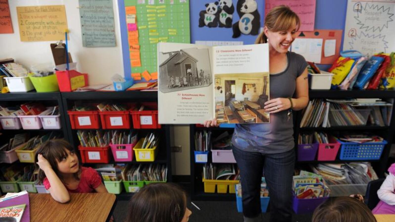 Teacher Haiti Johnson fields questions from students in her social studies class at Teller Elementary School in Denver.