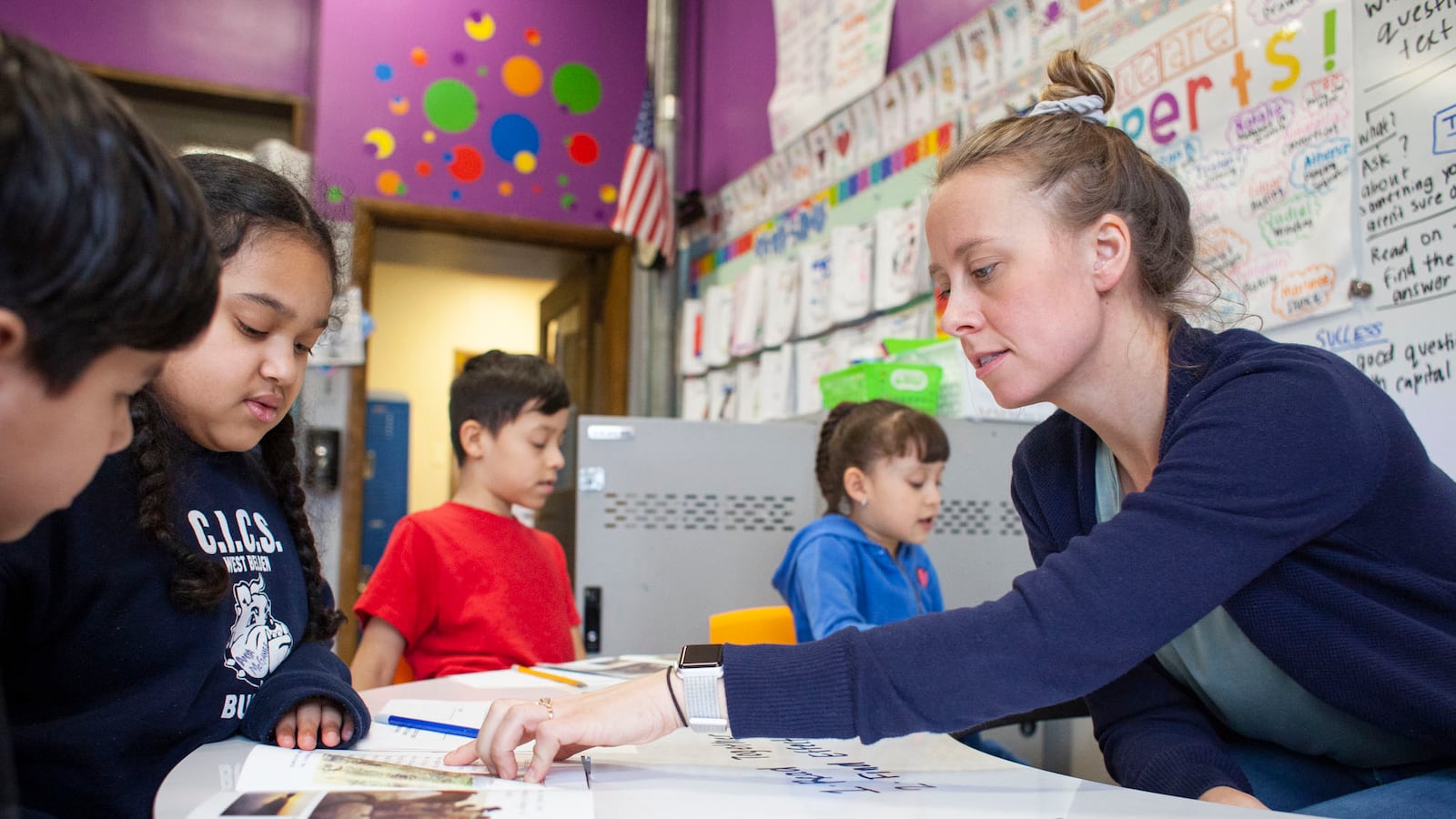 Teacher Kathy McInerney guides students during a small group lesson during class at CICS West Belden. The Chicago charter school employs the personalized learning method for its K-8 students. The school is part of the Chicago International Charter School network, and is managed by Distinctive Schools,.