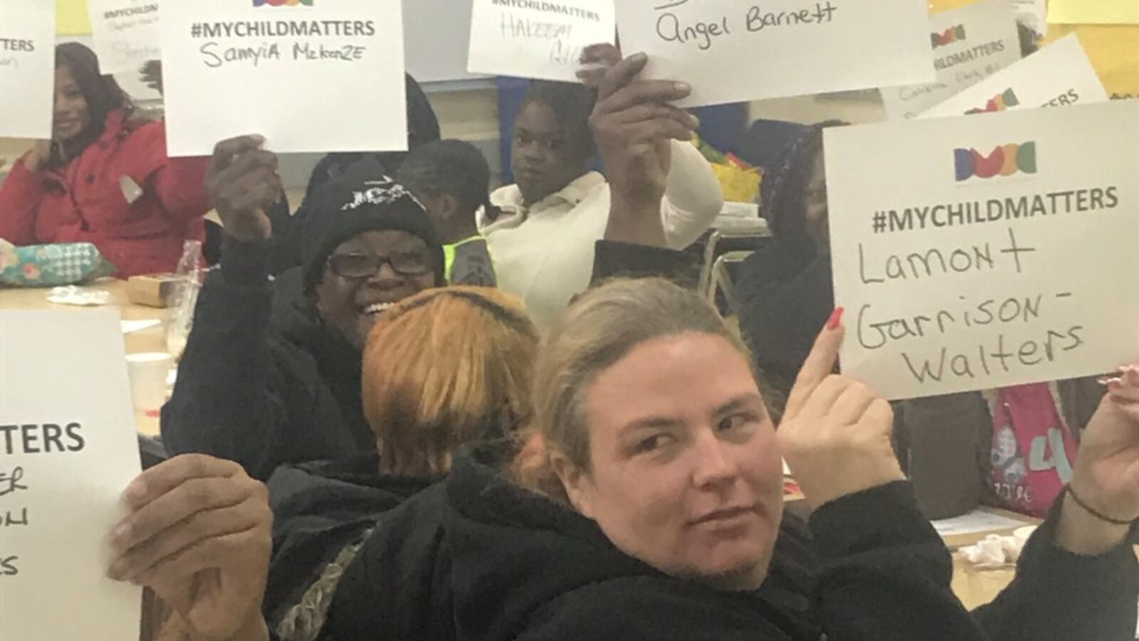Parents at the GEE Edmonson Academy in Midtown, Detroit, showing support for SB 574.
