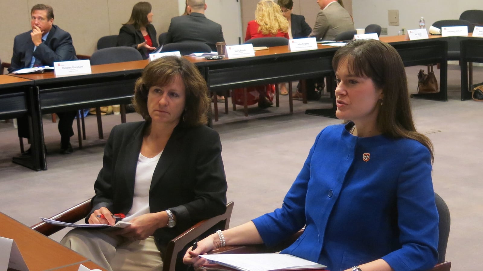 Education Commissioner Candice McQueen (right) talks with educators during a breakout session at the first testing task force meeting this year.