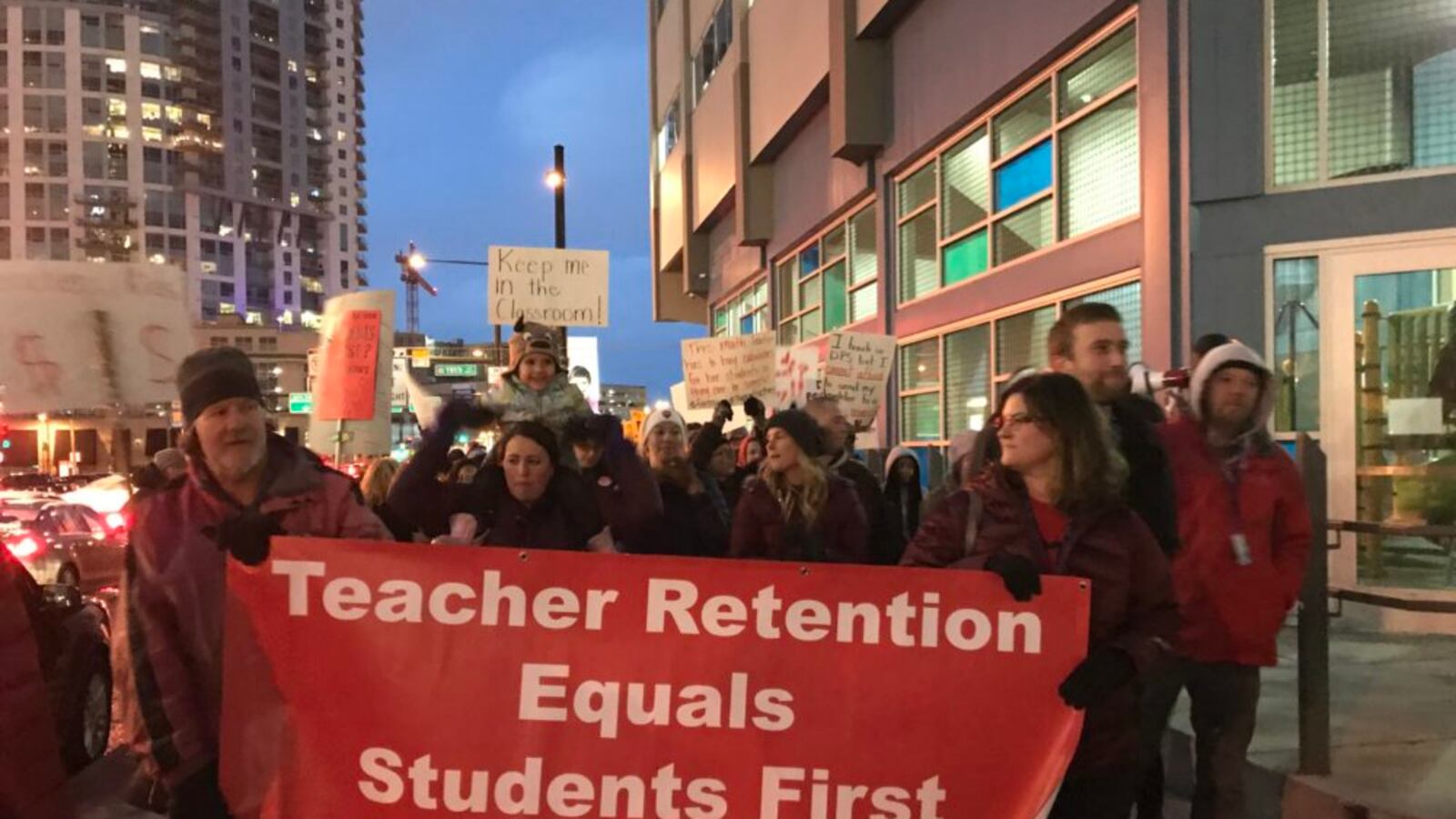 Denver teachers rally for more pay outside a school board meeting  on Jan. 24, 2019.