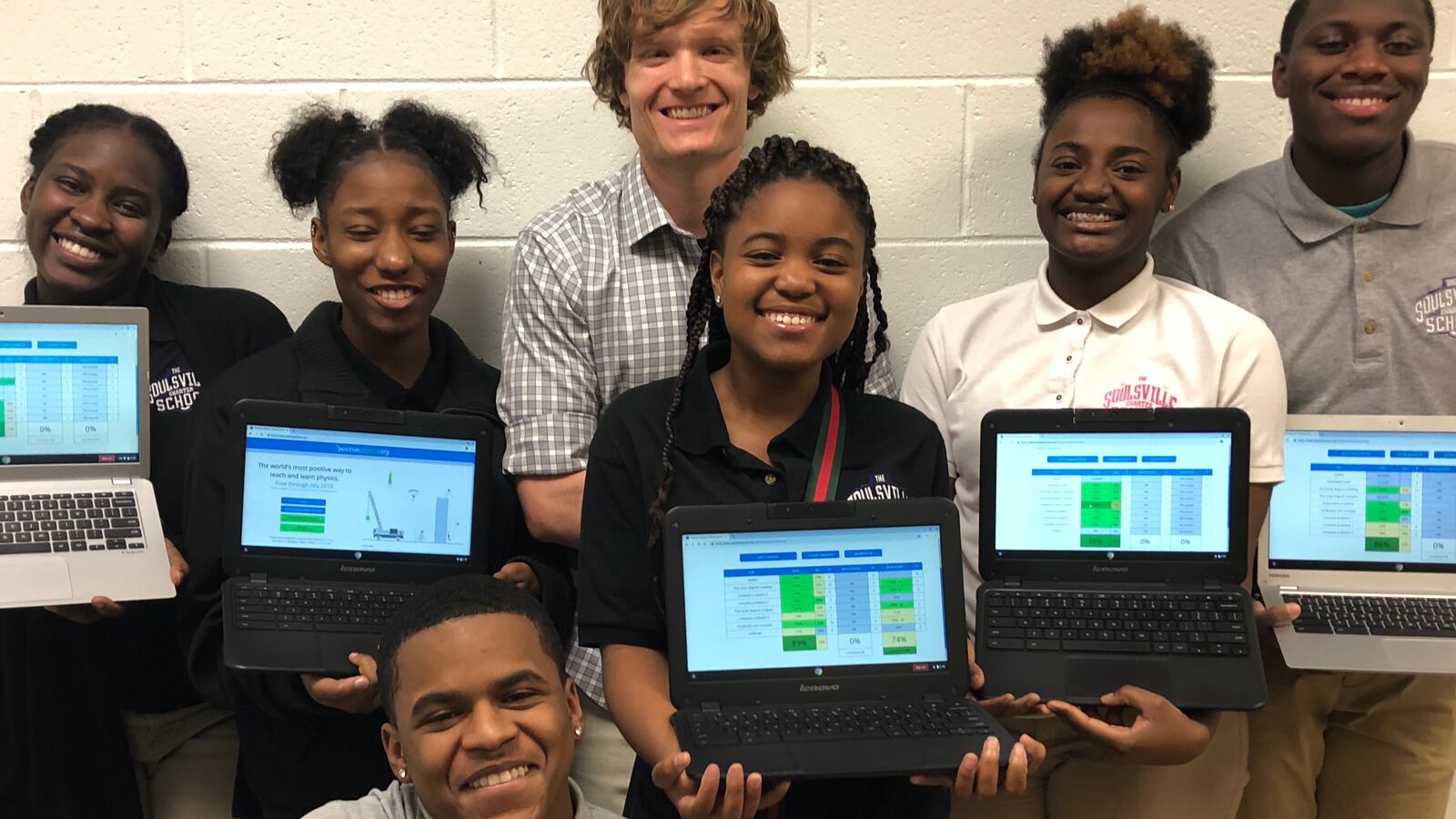 Jack Replinger poses with his students at The Soulsville Charter School.