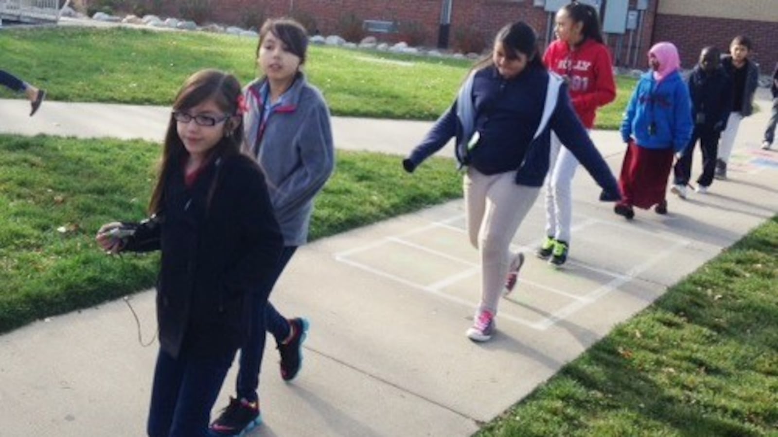 Fifth-graders at Kenton Elementary school participate listen to a 16-minute podcast on trickster characters in literature.