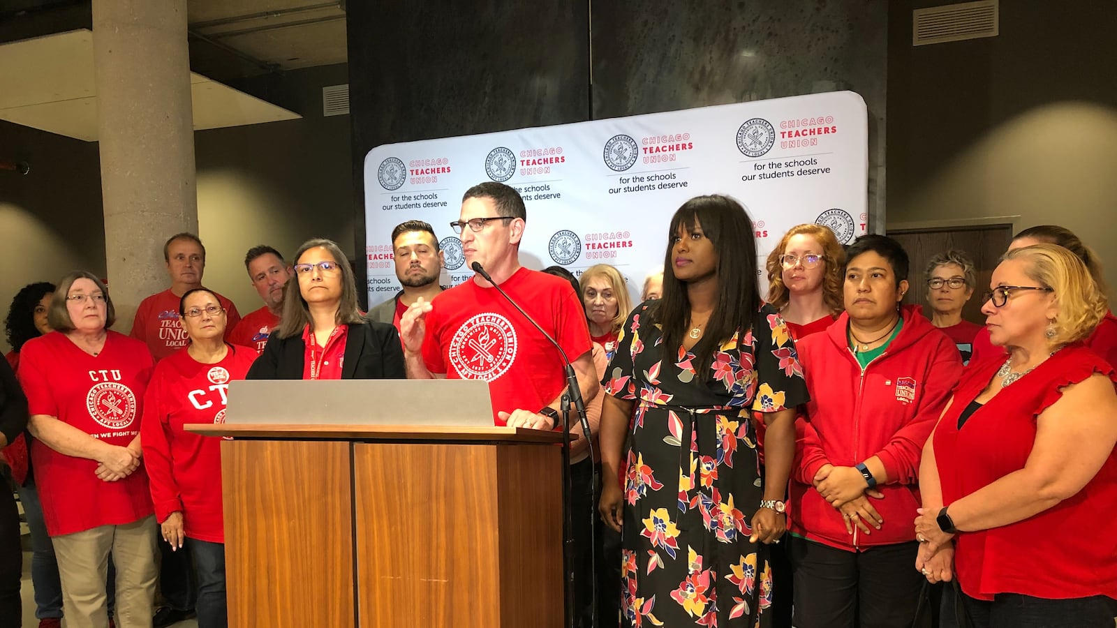 Chicago Teachers Union President Jesse Sharkey and Vice President Stacy Davis Gates announce the results of a strike vote Thursday night at union headquarters.