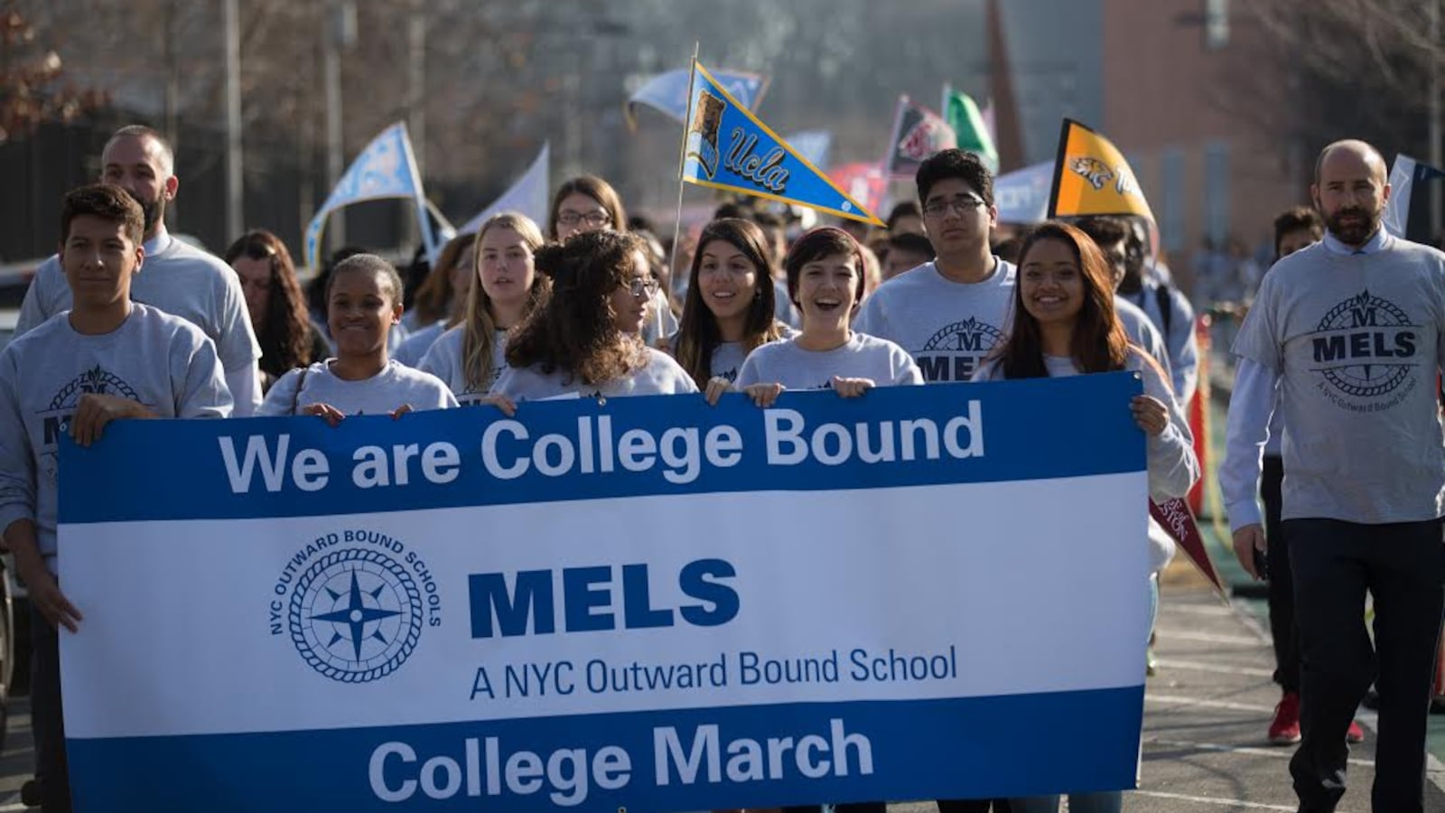 MELS students marched last December to celebrate their college acceptances.