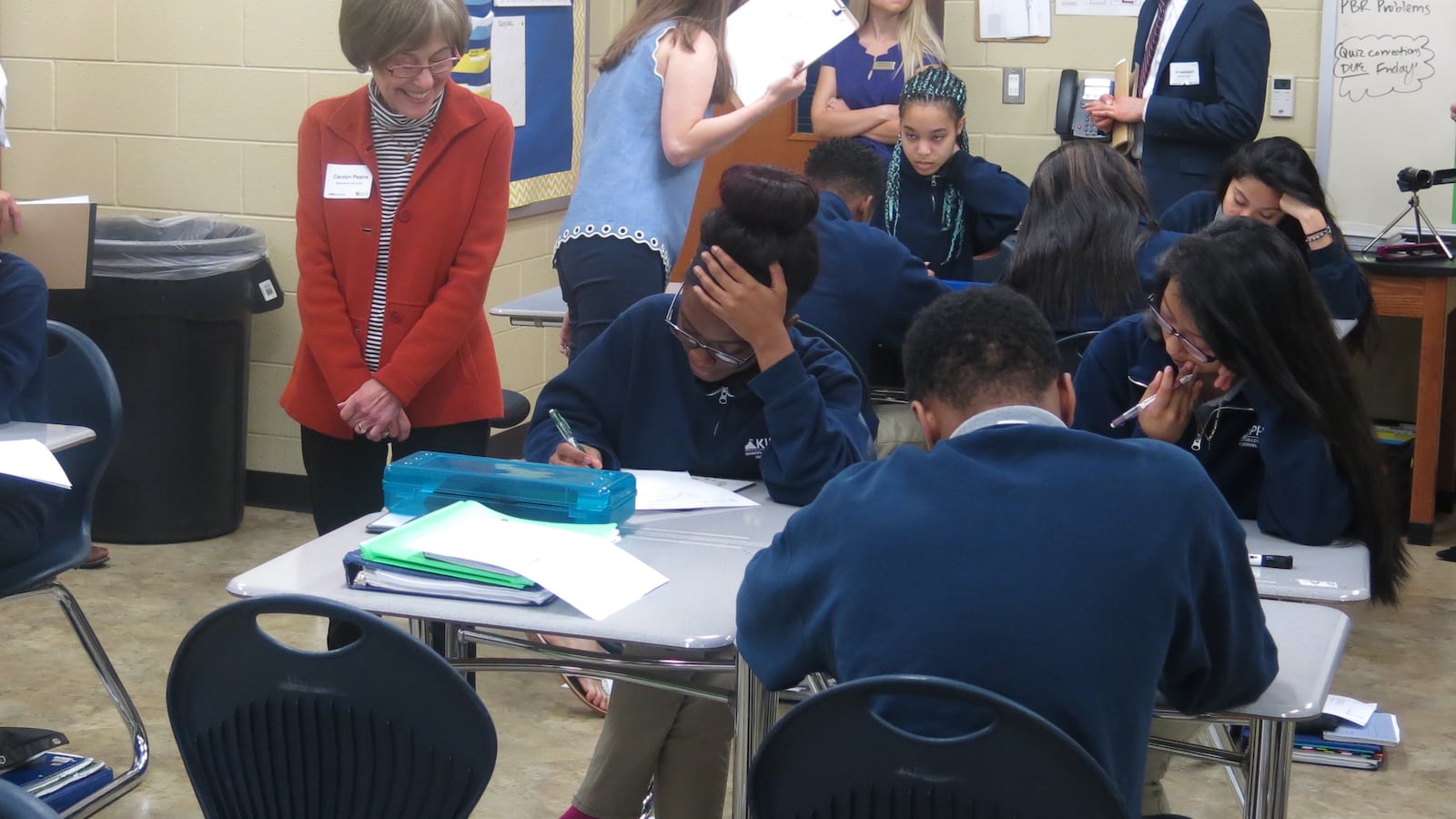State Board of Education member Carolyn Pearre (left) observes students in a 10th-grade geometry class at KIPP Collegiate High School in East Nashville. KIPP Nashville's newest schools will be in the State Board school district.