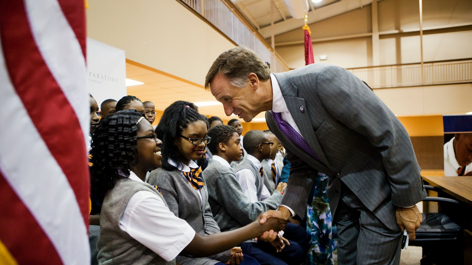Gov. Bill Haslam greets a student at a Memphis charter school in 2011. (Photo by Kyle Kurlick/Memphis Daily News)