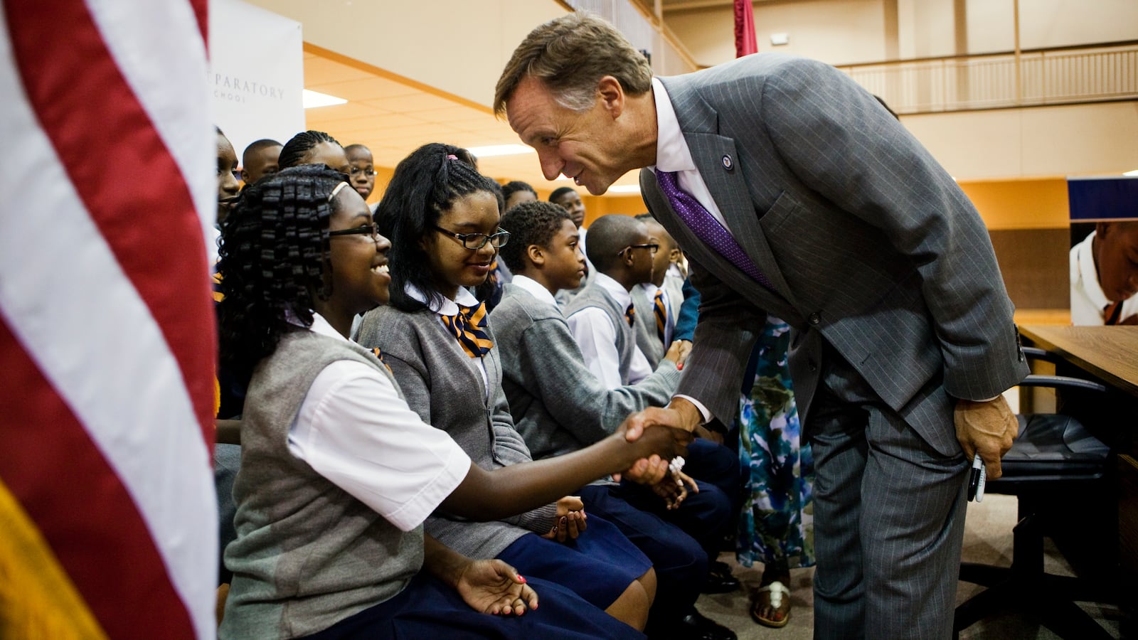 Gov. Bill Haslam greets a student at a Memphis charter school in 2011. (Photo by Kyle Kurlick/Memphis Daily News)