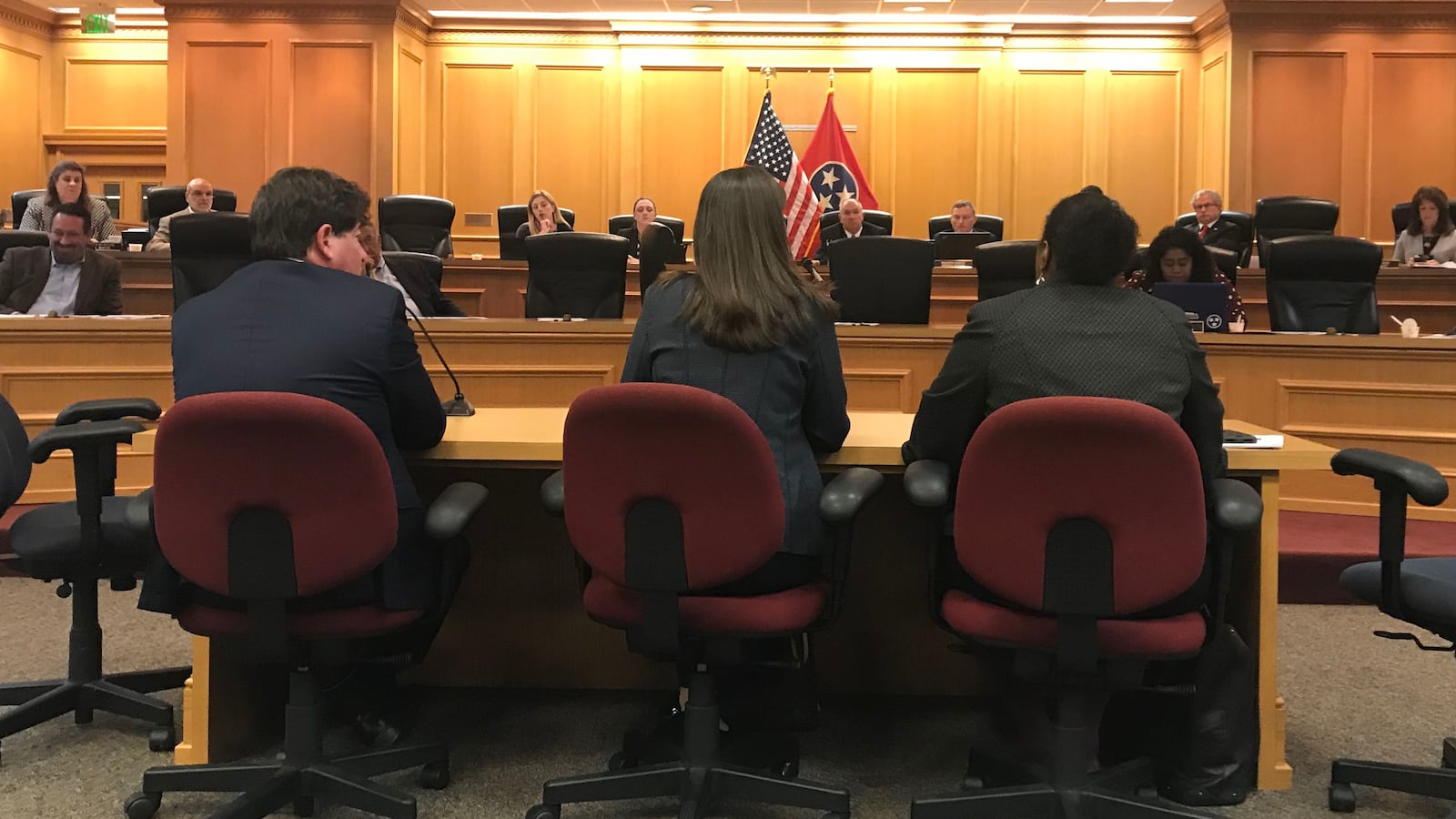 Education Commissioner Candice McQueen (center) testifies before Tennessee lawmakers along with Questar CEO Stephen Lazer and Assistant Education Commissioner Nakia Towns.