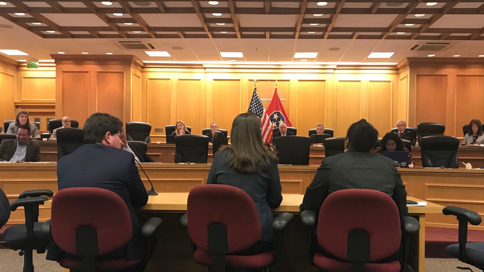Education Commissioner Candice McQueen (center) testifies before Tennessee lawmakers along with Questar CEO Stephen Lazer and Assistant Education Commissioner Nakia Towns.