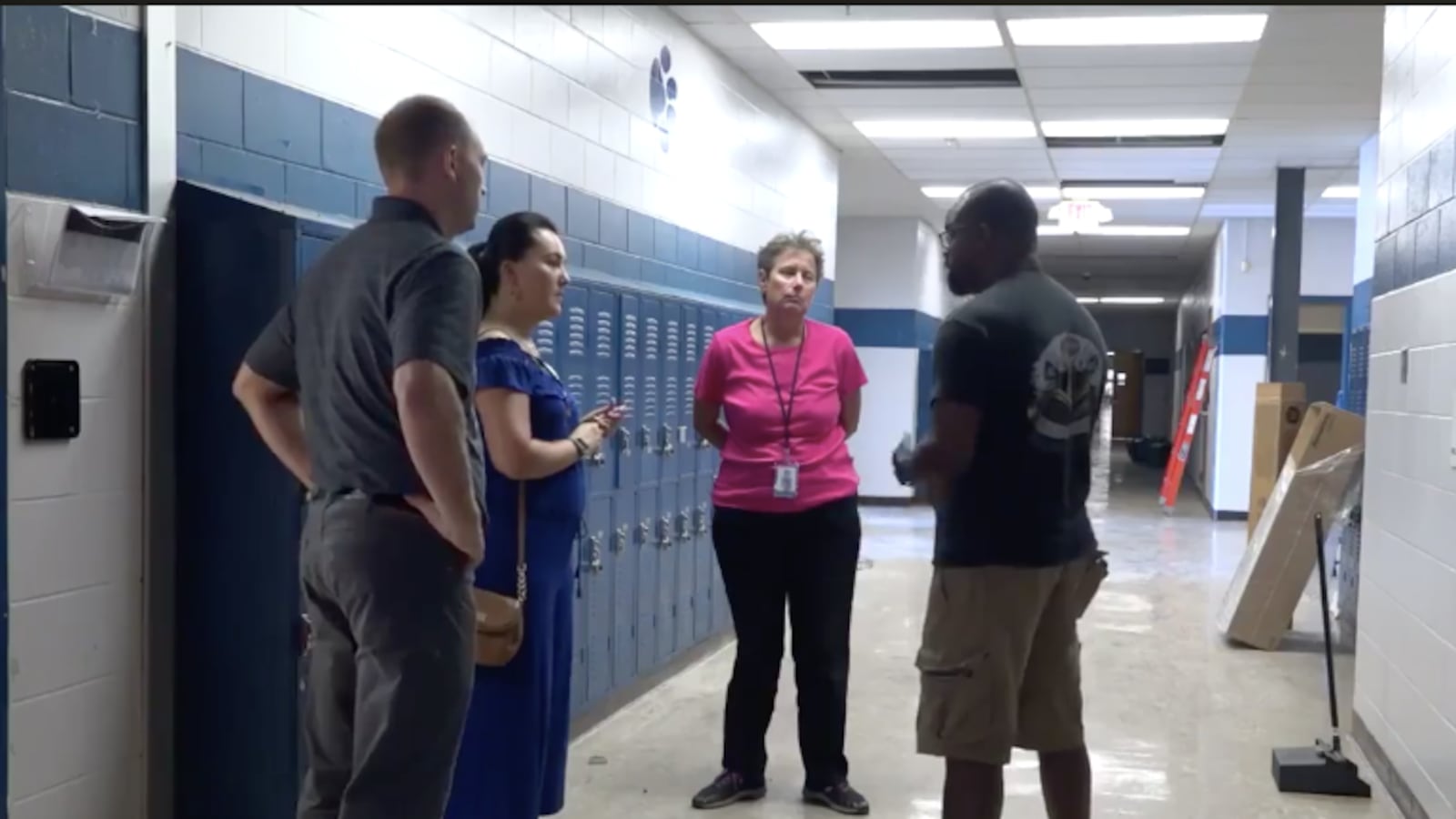 Shelby County Schools employees tour Kirby High School during repairs. District officials announced Thursday that the school would remain closed due to a pest infestation.
