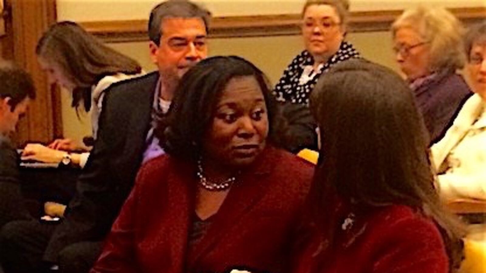 Tennessee Assistant Education Commissioner Nakia Towns confers with Education Commissioner Candice McQueen on Wednesday before appearing before a state Senate hearing about TNReady.