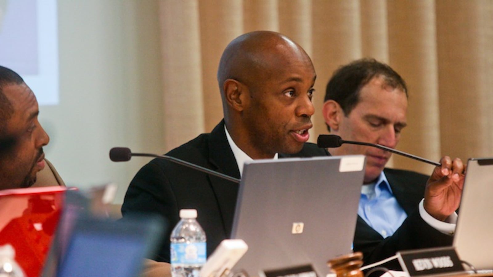 Superintendent Dorsey Hopson II, center, with Shelby County school board president Kevin Woods, left, and board member Billy Orgel, right.