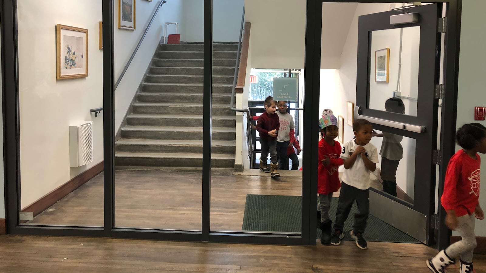 Students walk through the hallways at Detroit Prep, a charter school that is among more than 800 K-12 schools in the state that must close to slow the spread the coronavirus.