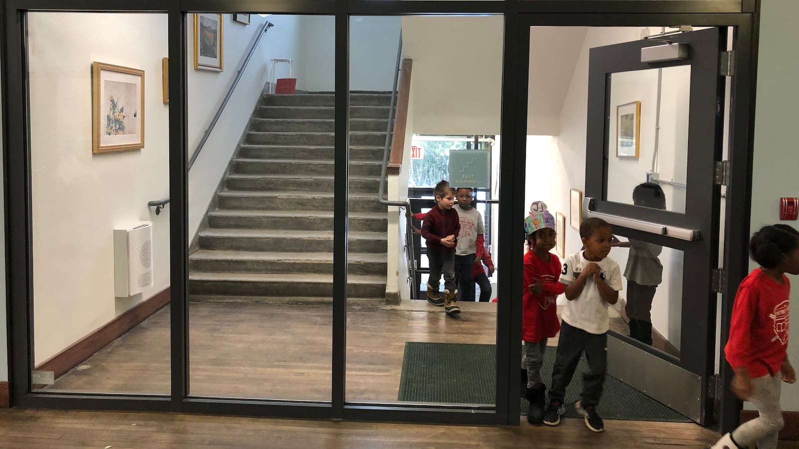 Students walk through the hallways at Detroit Prep, a charter school that is among more than 800 K-12 schools in the state that must close to slow the spread the coronavirus.