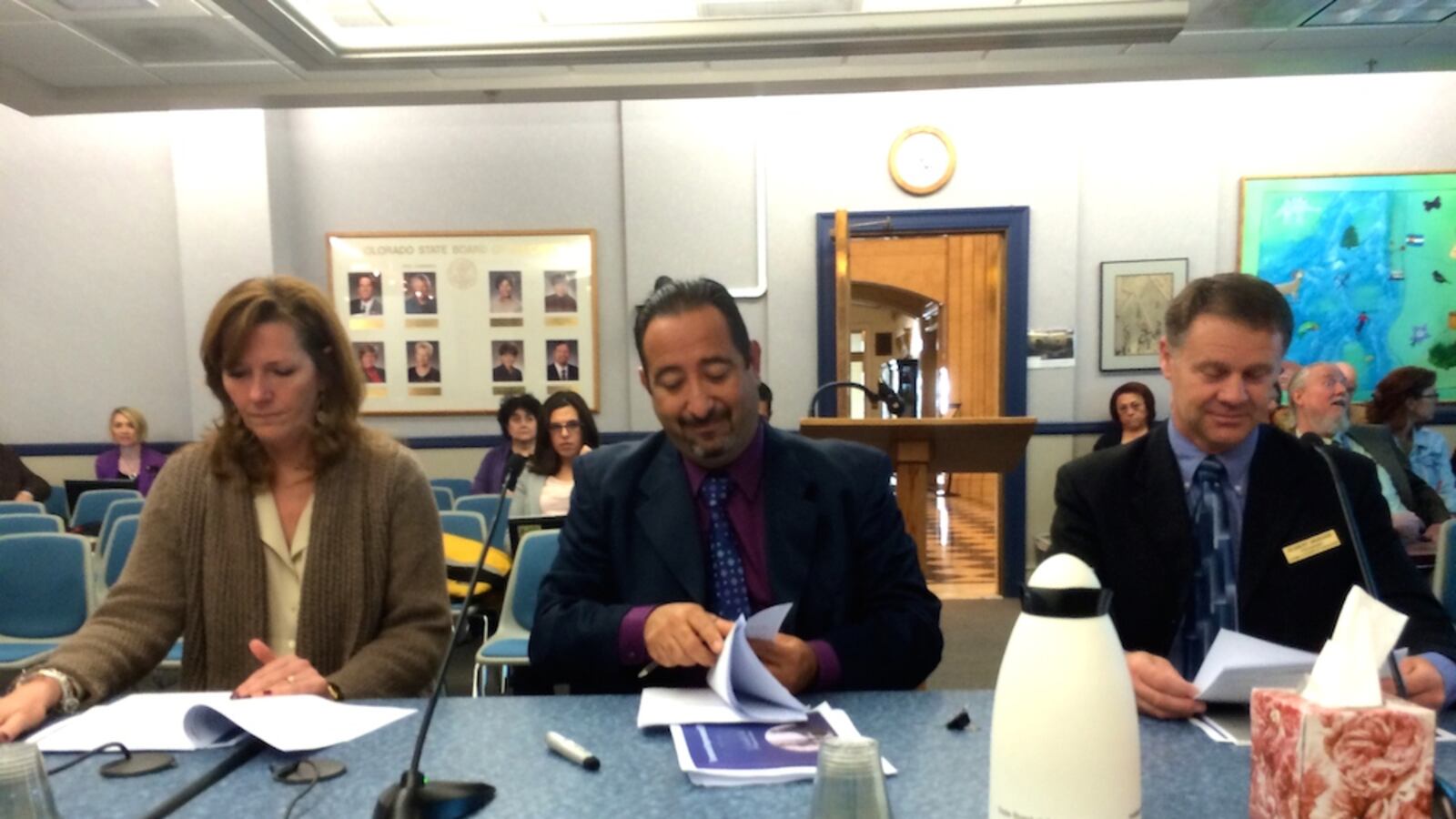 Adams 14 Superintendent Pat Sanchez, center, prepares to address the State Board of Education April 10, 2014. He is joined by Assistant Superintendent Kandy Steel, right, and the district’s board president Robert Vashaw.