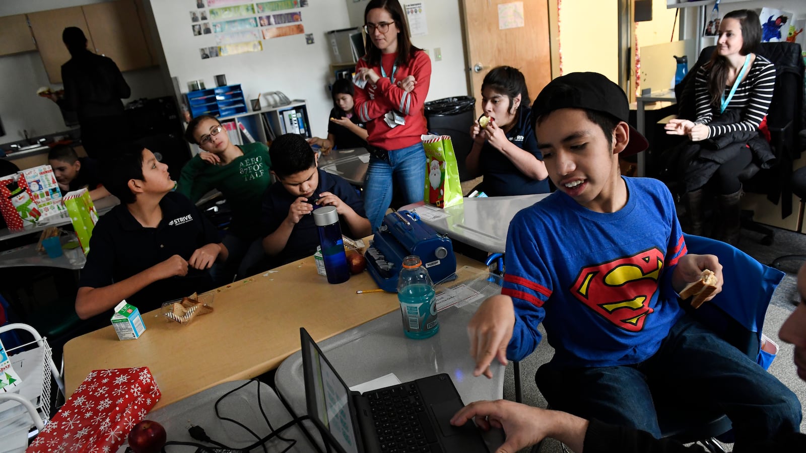Josue Bonilla, 13, in Superman shirt, in STRIVE Prep Federal's Wisconsin classroom (Photo by Helen H. Richardson/The Denver Post for Chalkbeat).