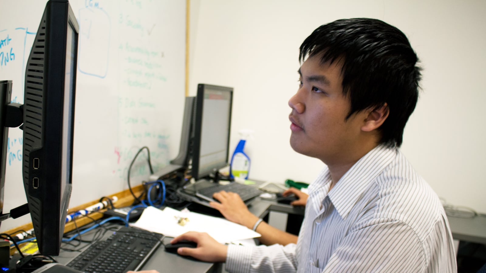 Denver student Quang Nguyen works at an internship this past summer.