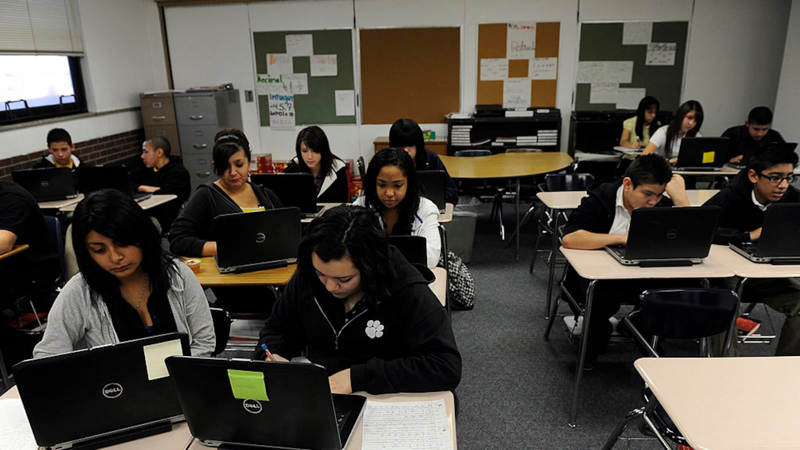 Students at work on laptops as they take an online math class in Commerce City, Colorado in 2012.