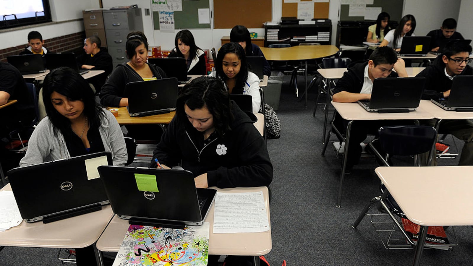Students at work on laptops as they take an online math class in Commerce City, Colorado in 2012.