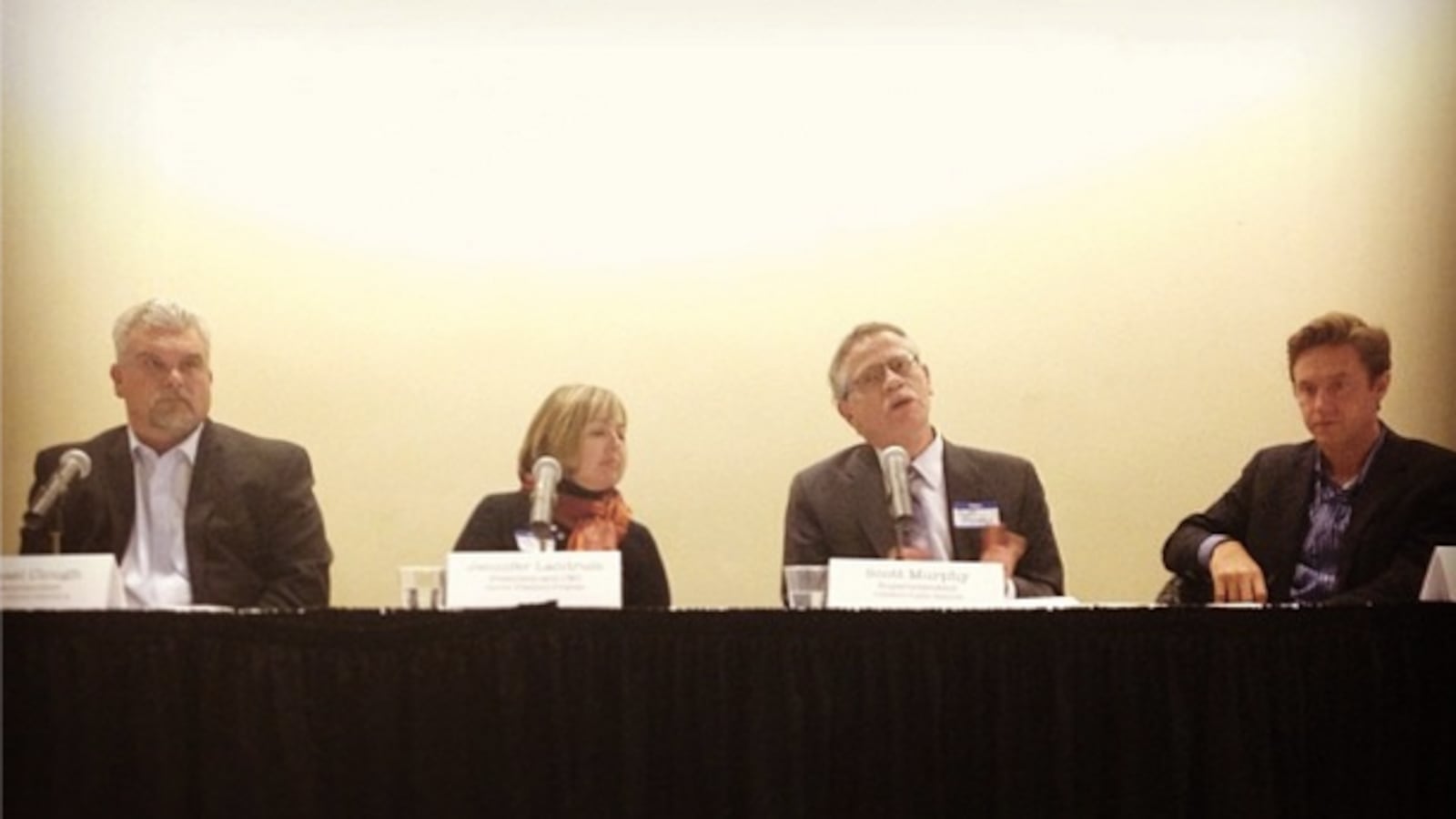 A panel including, from left, Sheridan Schools Superintendent Mike Clough, Denver Preschool Program CEO Jennifer Landrum, Littleton Public School Superintendent Scott Murphy and State Sen. Mike Johnston couldn't answer, specifically, how the state should move forward after voters rejected an income tax increase to overhaul education funding. Photo by Maura Walz