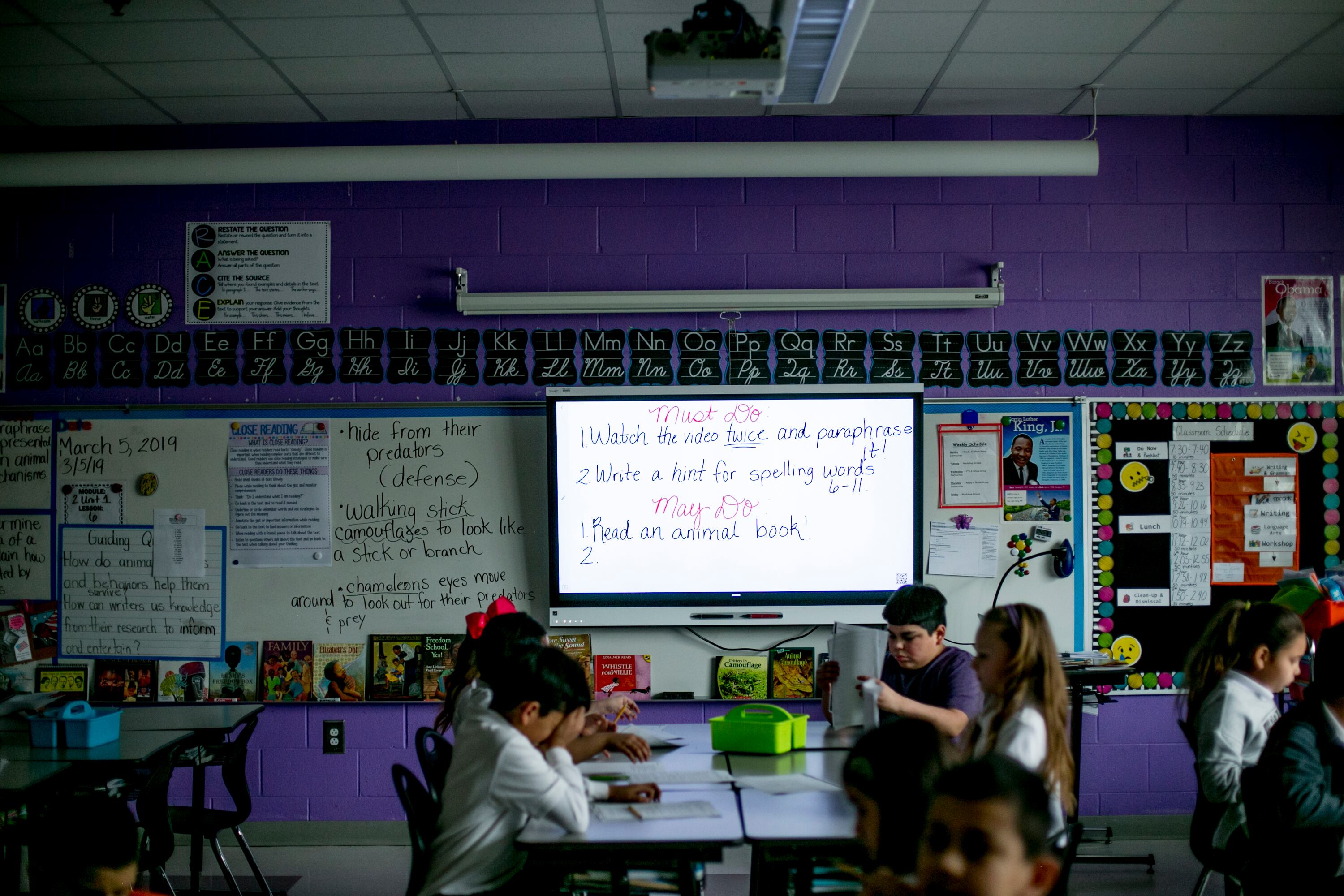 A group of elementary students in a classroom.