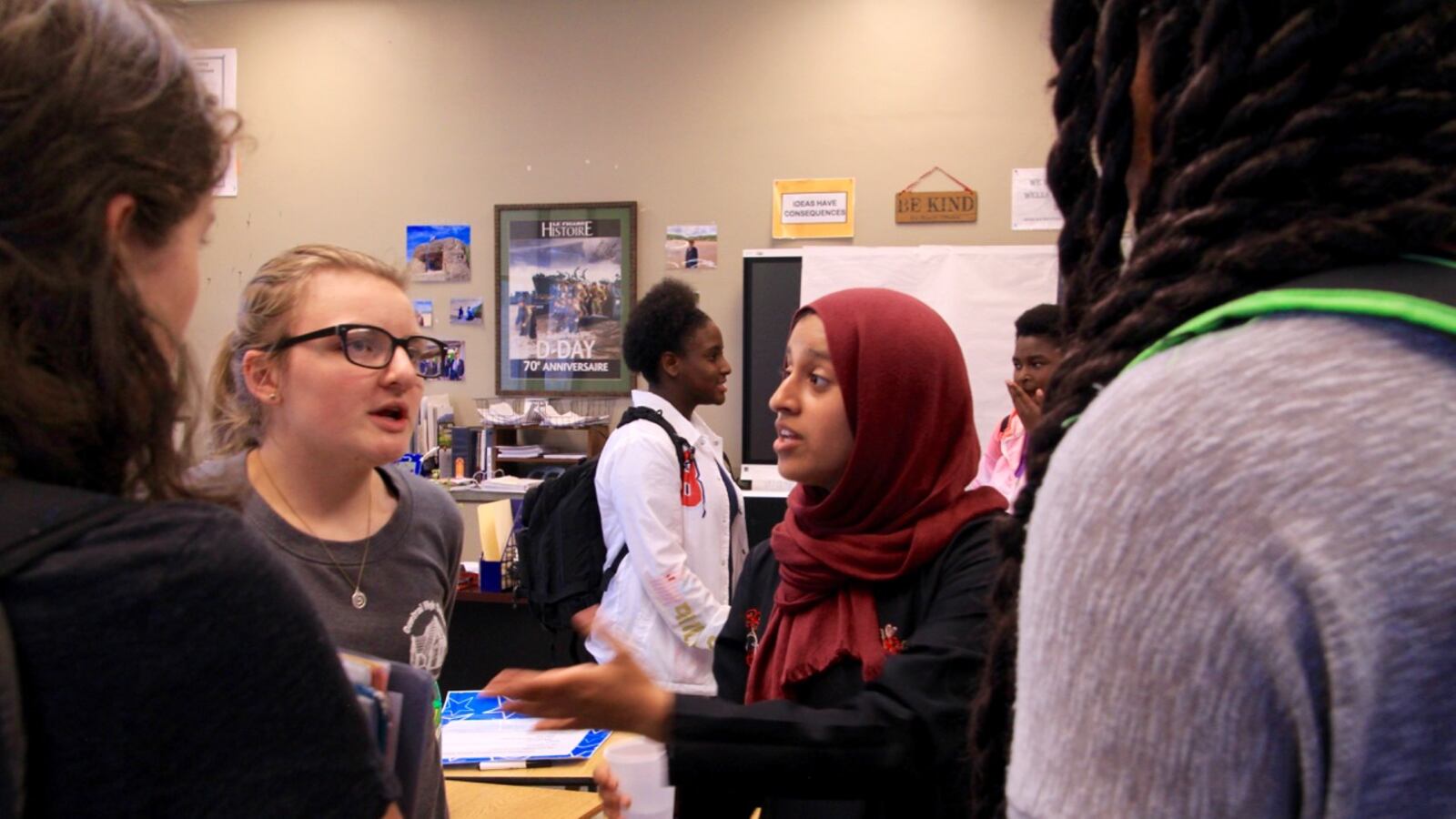 From left: Audrey Firrone and Amal Altareb talk with their peers during an after-school club meeting at Central High School. The two Memphis students helped to found Courageous Conversations.