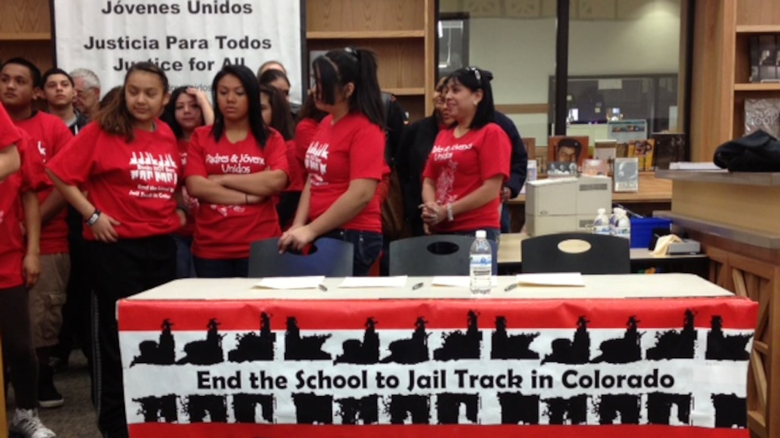 Student leaders with Padres & Jovenes Unidos attend a news conference Tuesday on the new intergovernmental agreement outlining the role of resource officers in Denver schools.